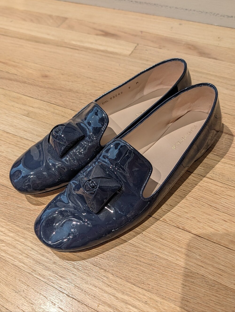 Stuart Weitzman Patent Leather Navy Loafers with Decorative Tab